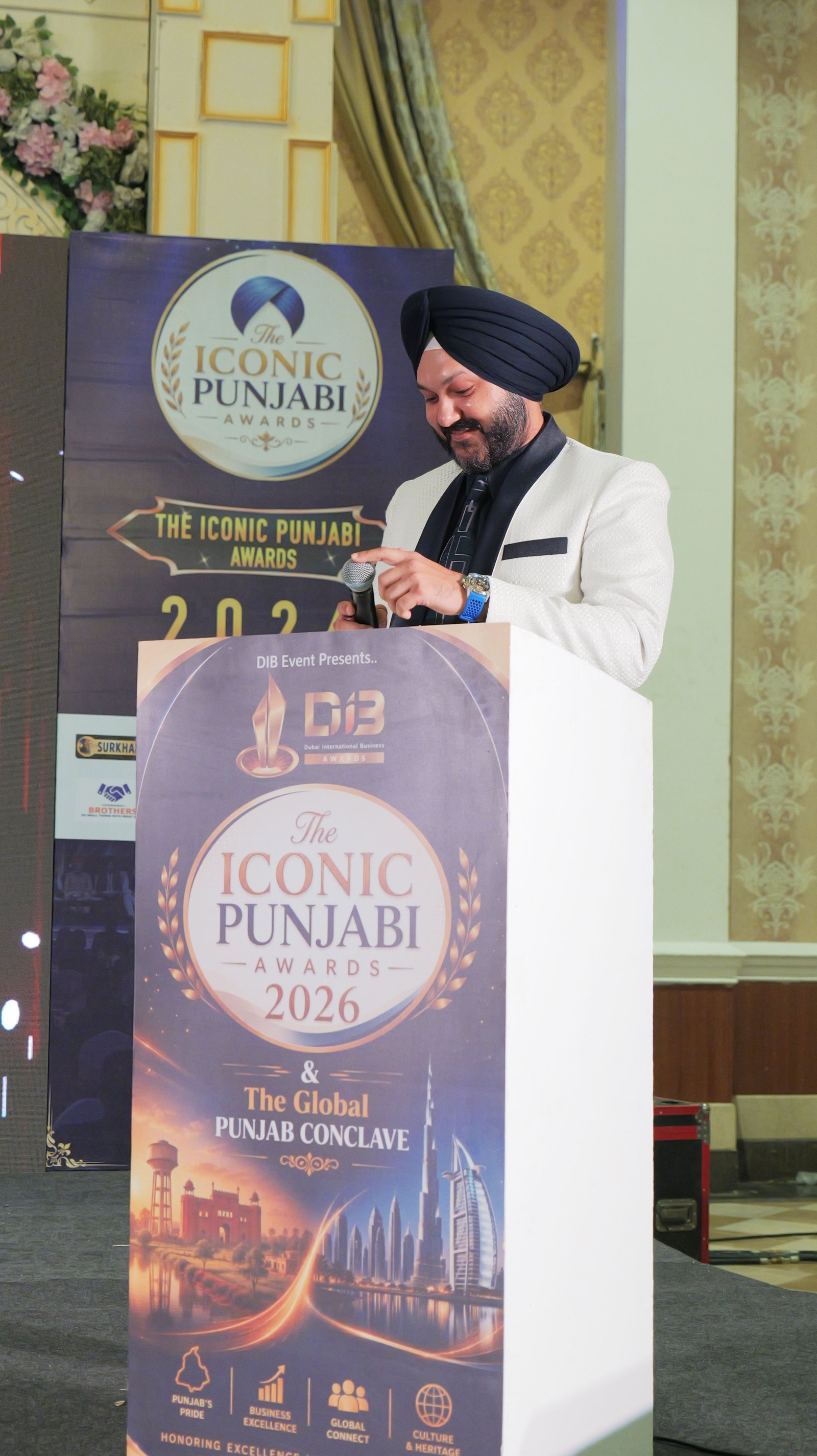 Dr. Nagpal delivering speech at Iconic Punjabi Awards 2026 podium